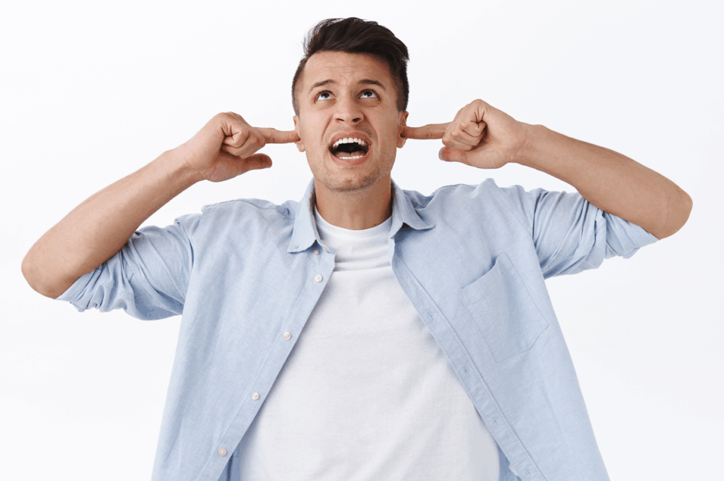 Sound Abatement 101 man with fingers in his ears